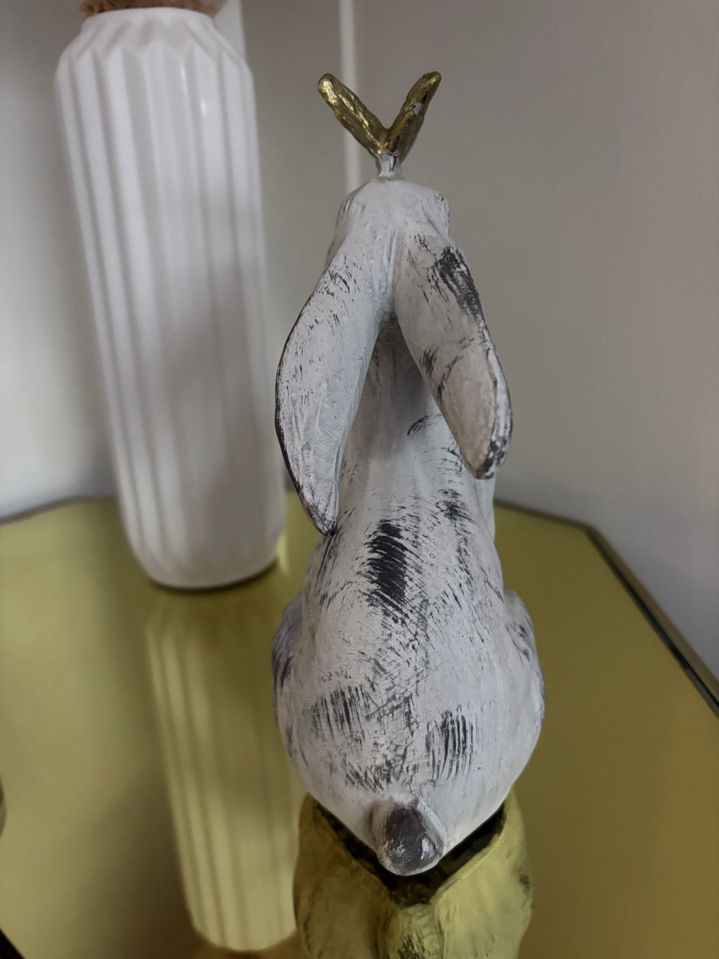 Aged Stone Rabbit with Butterfly