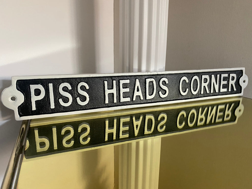 Piss Heads Corner Sign