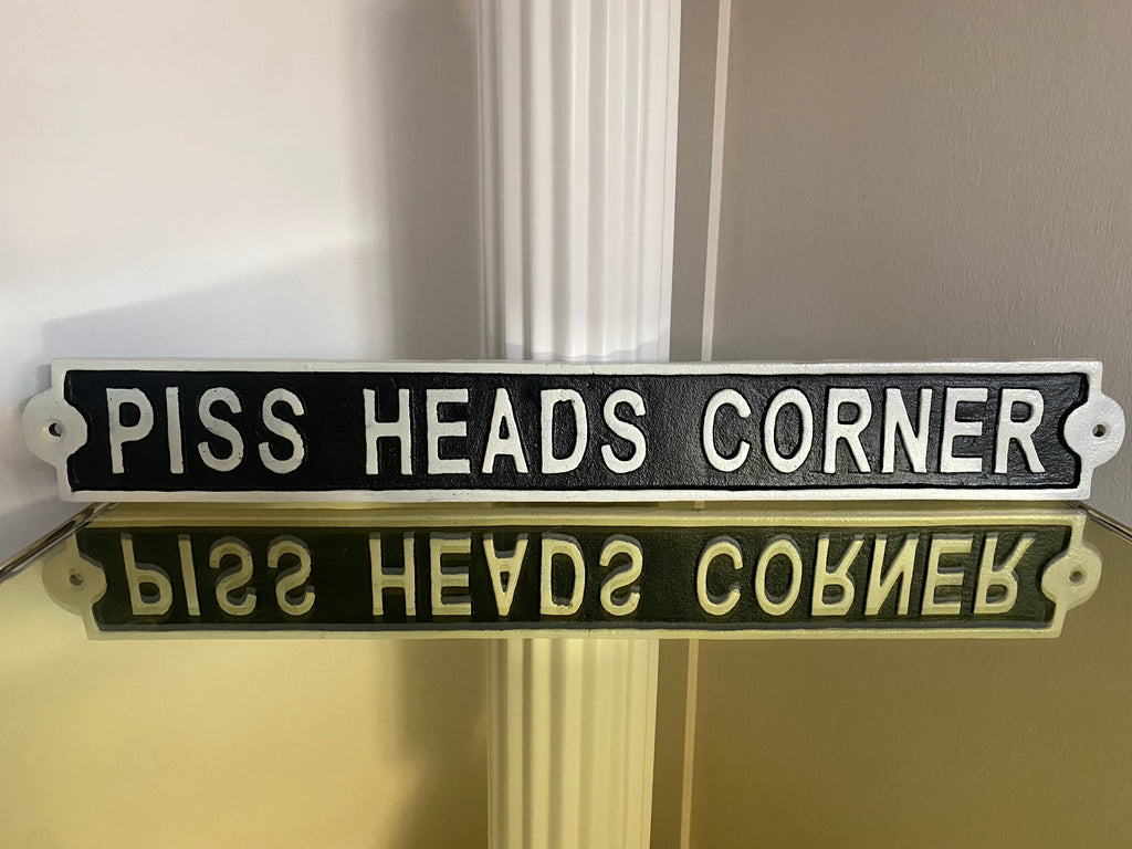 Piss Heads Corner Sign