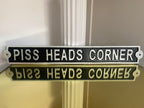 Piss Heads Corner Sign