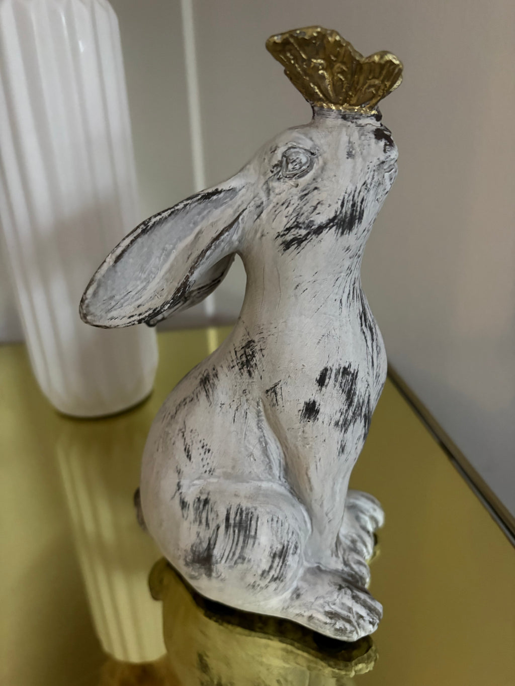 Aged Stone Rabbit with Butterfly